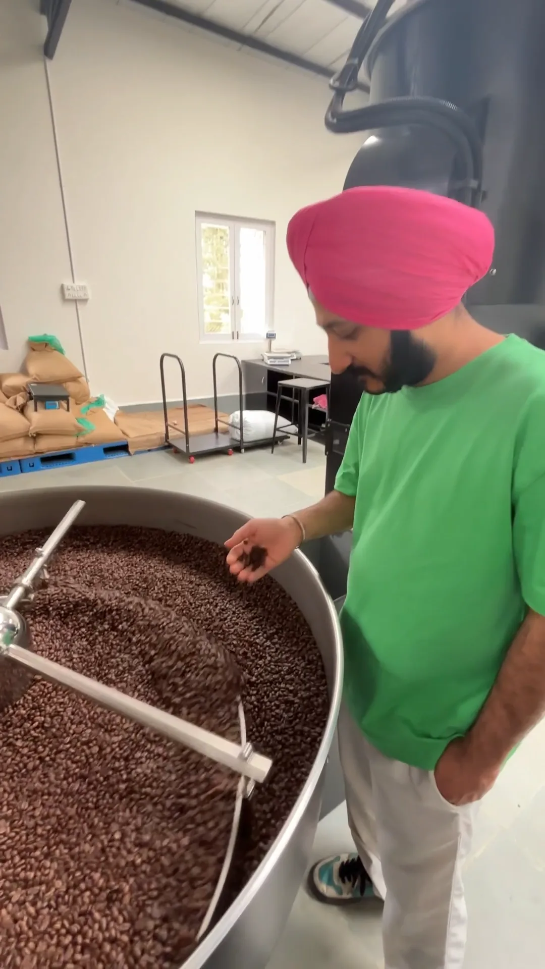 Premium Arabica coffee beans being roasted for Theka Coffee RTD cans